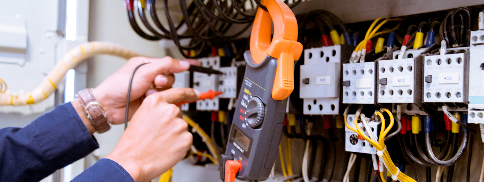 Electrician measurements with multimeter testing current electri